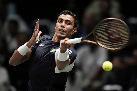 Davis Cup Tennis, Italy vs Brazil: Thiago Monteiro, of Brazil, makes a return against Matteo Arnaldi